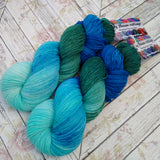 hand dyed yarn sock weight , water greens and blues